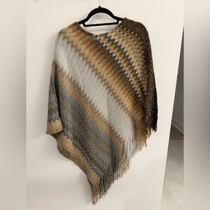 Poncho - sweater with fringe. One size. Brown, black and tan. Pull over head